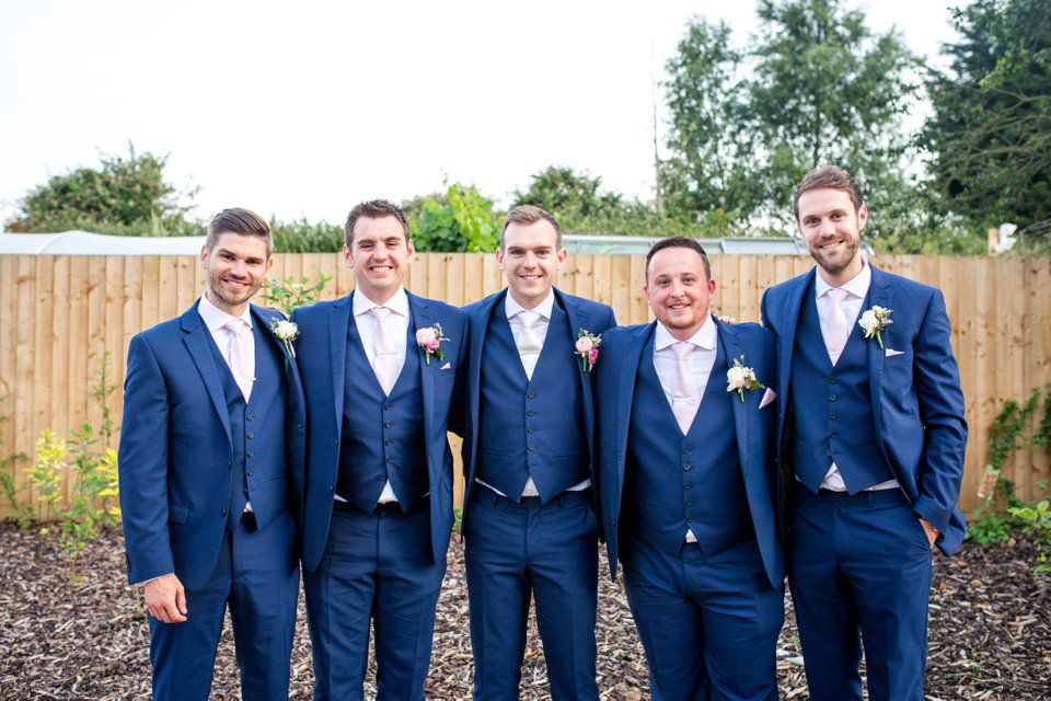 Travel themed wedding_Suffolk_norfolk wedding photography_tatum reid_pastels_world map_pink bridesmaid dresses_natural wedding photography_outside music bill downs (83)