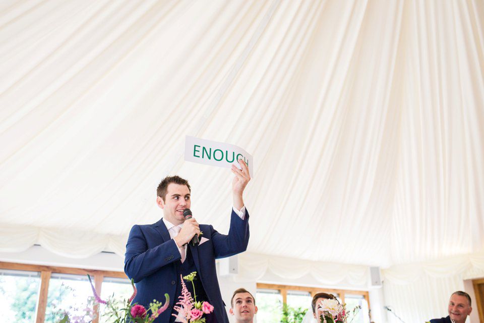 Travel themed wedding_Suffolk_norfolk wedding photography_tatum reid_pastels_world map_pink bridesmaid dresses_natural wedding photography_outside music bill downs (49)