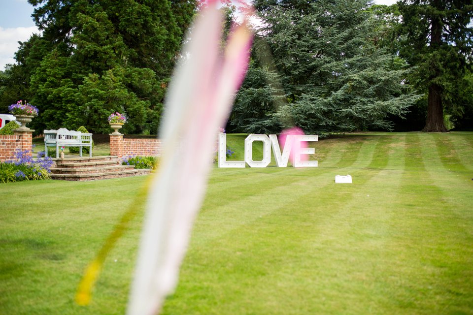 Garden Barn Suffolk wedding photography_tatum reid_blush pink bride_pastel dresses, multicolour, diy wedding decor_succulents_paper flowers_garden games_newmarket (54)