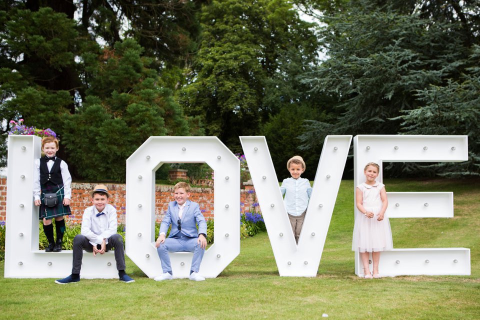 Garden Barn Suffolk wedding photography_tatum reid_blush pink bride_pastel dresses, multicolour, diy wedding decor_succulents_paper flowers_garden games_newmarket (38)