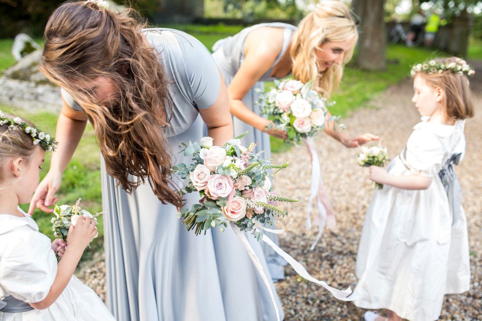 Soft grey and blue tones_bridesmaids dresses_suzanne neville gown_north norfolk wedding photographer_white calligraphy_tatum reid_celia and tom (36)