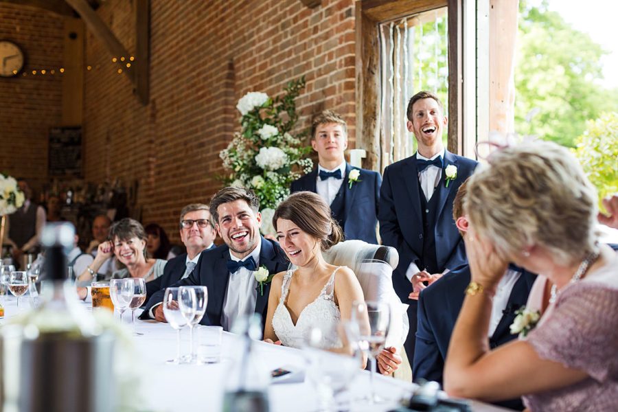 Southwood Hall wedding bride and groom laughing at speeches