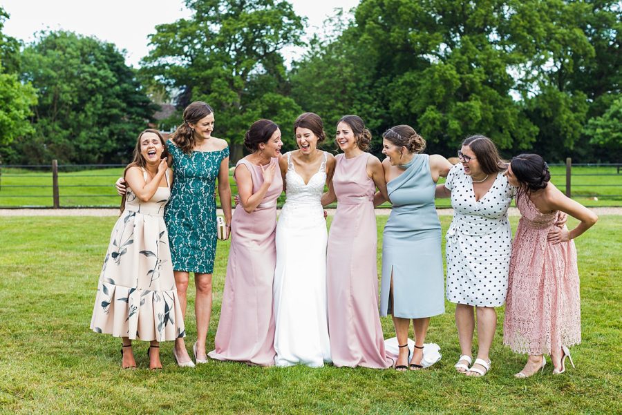 Southwood Hall wedding candid photo of bride with girlfriends laughing