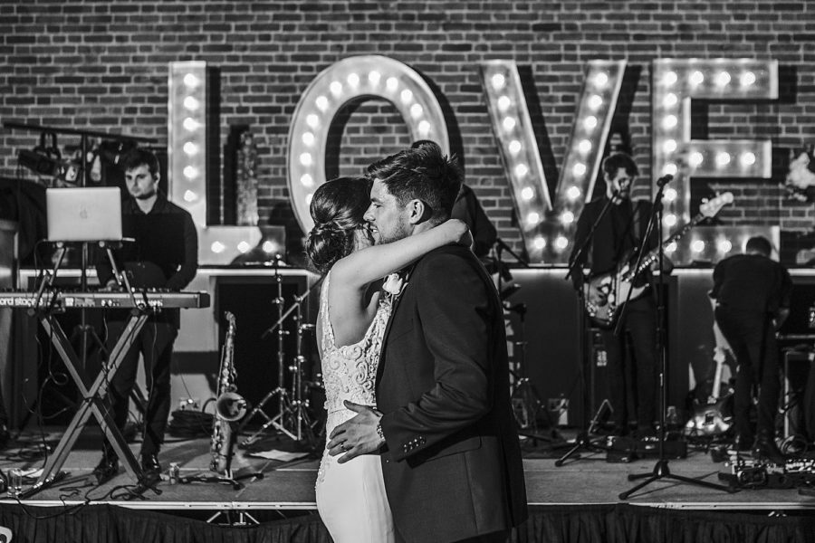 Southwood Hall wedding with bride and groom dancing in front of LOVE light up letters